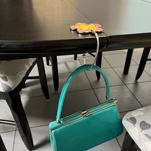 Purse hanger for table when dining out